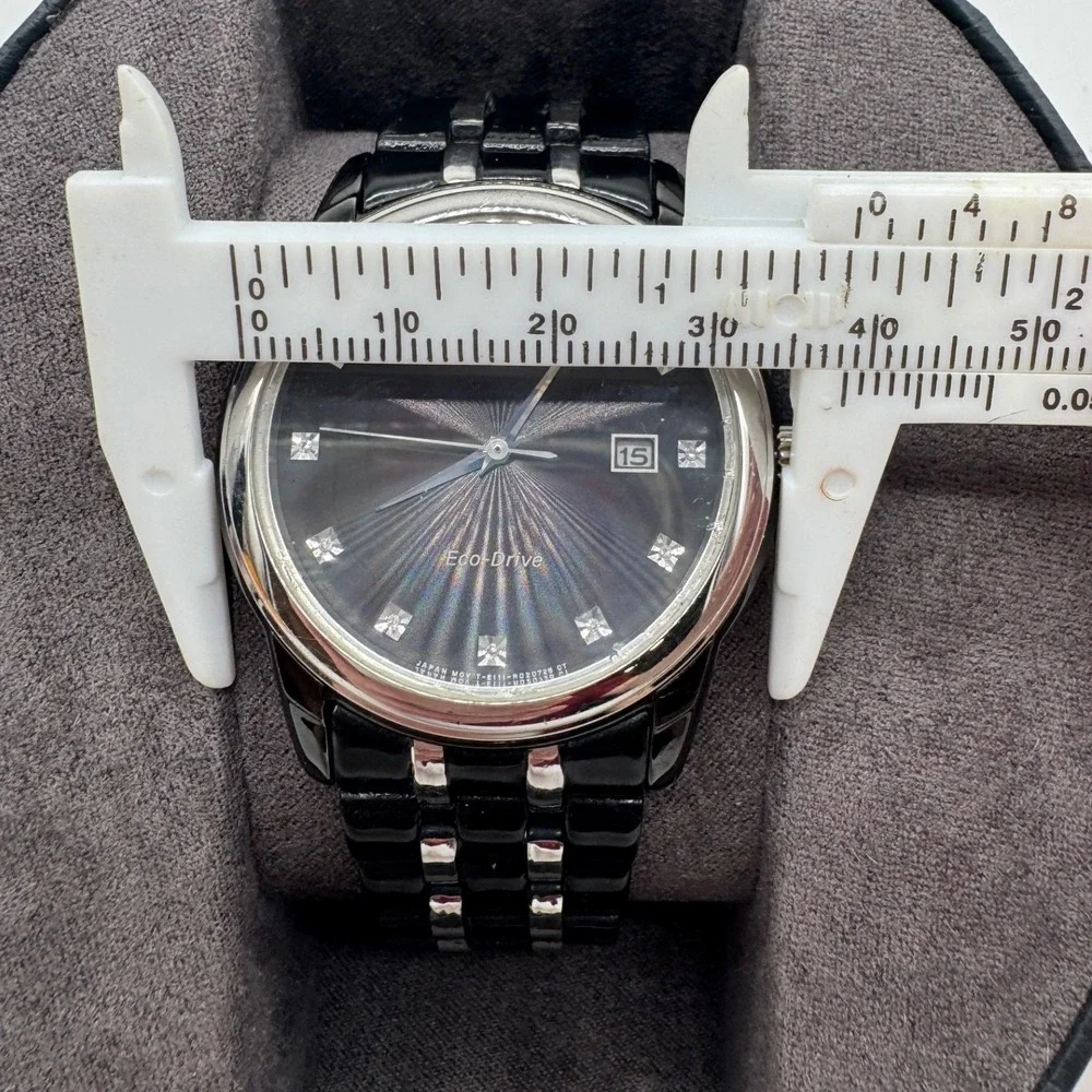 Citizen Eco-Drive Black Dial Diamond Marker Two Tone Steel Watch E111-R020728